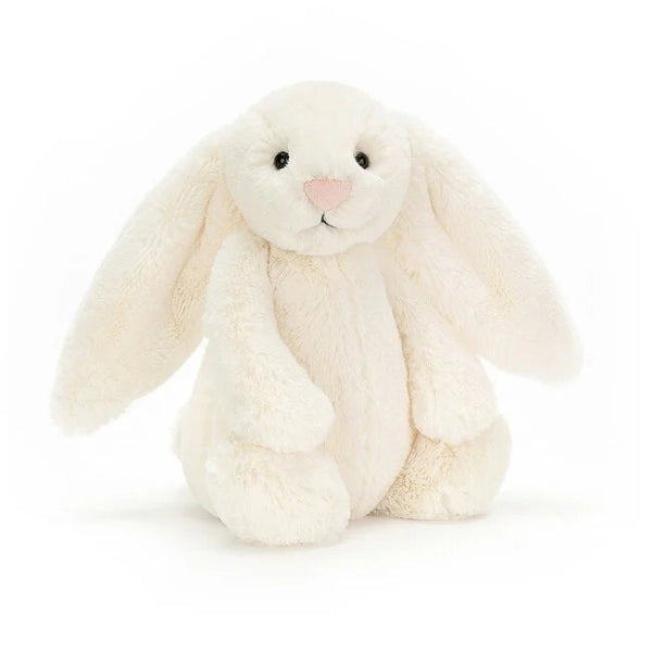 White plush bunny toy on a white background